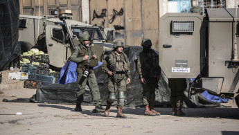 : Israeli soldiers seen during an Israeli military operation in the Far'a refugee camp near Jenin in the northern West Bank.