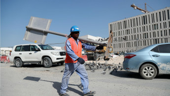 Qatar migrant workers [Getty]