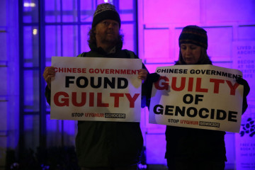 People stage a protest in front of the Chinese Embassy after the Uyghur Tribunal ruled that China committed genocide against Uyghurs and other ethnic minorities through policies such as coerced birth control and sterilization in London, United Kingdom