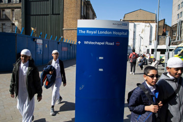 Main entrance to the Royal London Hospital in East London, England, United Kingdom. Britain's biggest new NHS hospital The Royal London and Barts state-of-the-art new building which will sit behind the historic front block overlooking the Whitechapel