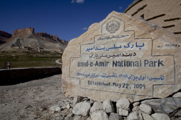 A sign marks the entrance to Band-E-Amir National Park September 6, 2009 in Band-E-Amir, Afghanistan. Located in the province of the Bamiyan Buddhas, in central Afghanistan, the park was declared Afghanistan's first National Park on April 22, 2009