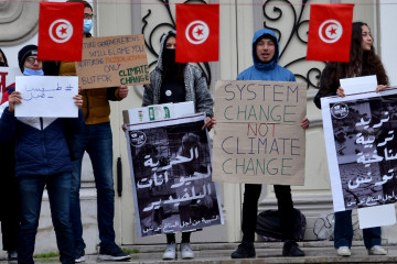 Protesters holding placards expressing their opinion during the demonstration. Protesters demonstrate to demand legislation policies, environmental plans and to reduce the effects of climate change and to include climate education in the public education system