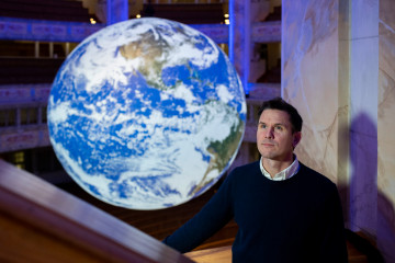 Luke Jerram with Gaia at Dresden Cathedral, Germany, 2023. Photo (c) Oliver Killig.JPG