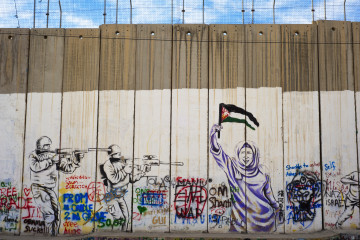 Israeli-built West Bank Wall surrounding Bethlehem with mural art, Bethlehem, West Bank, Israel