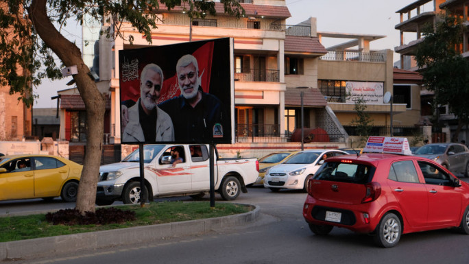 Photos of General Qassem Soleimani and Abu Mahdi al-Muhandis who were assassinated by direst orders of Donald Trump are displayed in the middle of Abu Nuwas street on March 16, 2023 in Baghdad, Iraq.