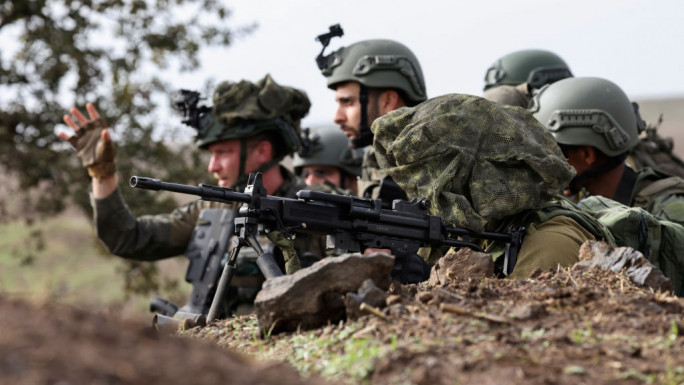 Members of the Israeli army's infantry 6th brigade take part in an assault coordination exercise near Moshav Kidmat Tsvi in the Israel-annexed Golan Heights