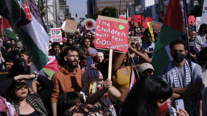 Pro-Palestinian protesters demonstrate during the 96th Academy Award