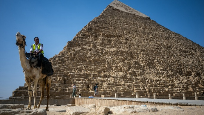 The stray dog was spotted on top of Khafre, the second tallest pyramid in Egypt. [Getty]