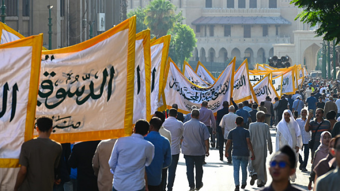  Members of Islamic Sufi orders march during a celebration of the Islamic New Year on July 7, 2024 in Cairo, Egypt. The Islamic New Year, also known as the Hijri New Year, starts on the first day of Muharram.