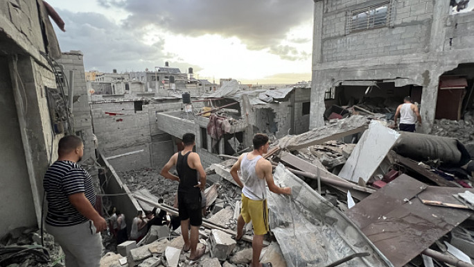 Palestinian residents conduct search and rescue operations among the rubbles of demolished house following an Israeli attack on a house at Nuseirat Refugee camp in Gaza City, Gaza on September 16, 2024. At least 10 people died, 13 injured.