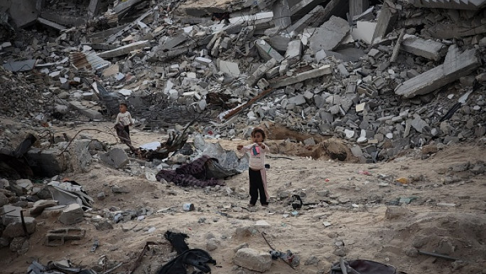  Palestinians continue to live among the rubble of houses destroyed in the Israeli attacks as there are almost no solid structures left in the city due to Israel's attacks on Gaza for more than a year, in Khan Yunis, Gaza on October 20, 2024. (Photo by Hani Alshaer/Anadolu via Getty Images)