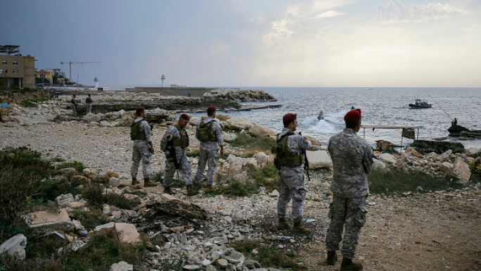 Lebanese soldiers inspect the beach at a landing site for a naval commando force which abducted a Lebanese mariner according to a military source, in the northern coastal town of Batroun on November 2, 2024. (Photo by IBRAHIM CHALHOUB/AFP via Getty)