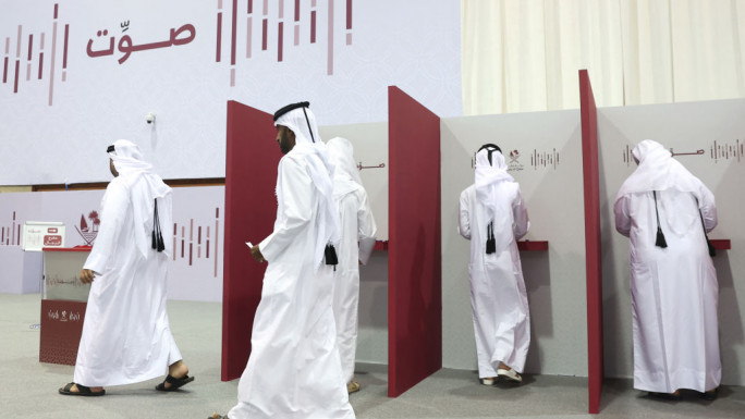 Men voting in polling booths