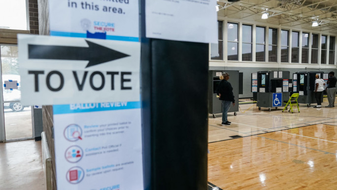 People vote at a polling place on Election Day in Atlanta, Georgia, on 5 November 2024 