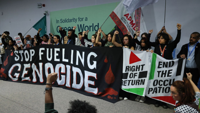 Protesters, in an apparent reference to the Israel's war on Gaza, demonstrate on the opening day of the UNFCCC COP29 Climate Conference on 11 November, 2024 in Baku, Azerbaijan