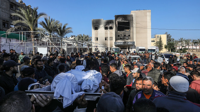  Relatives of the Palestinians who died as a result of Israeli attack on Al Mawasi area of Khan Yunis mourn as dead bodies were taken from the Nasser Hospital for burial in Khan Yunis, Gaza on November 21, 2024.