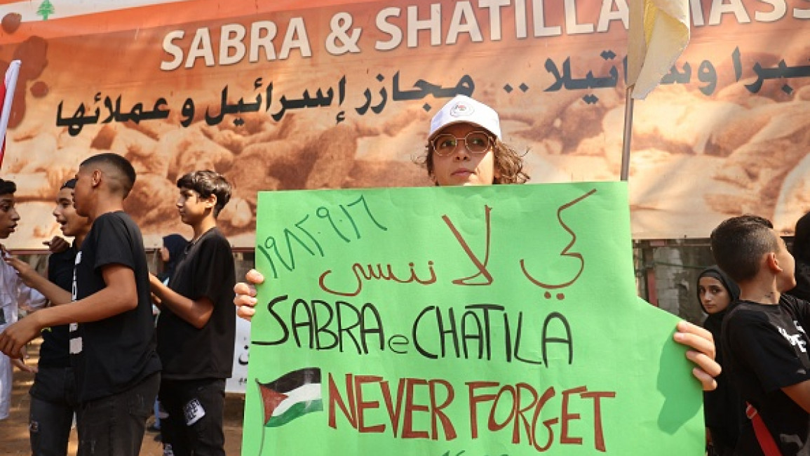 Palestinian demonstrators take part in a march to mark the forty year anniversary for the Sabra and Shatila massacre outside the Sabra camp for Palestinian refugees, in the southern suburbs of Lebanon's capital Beiru