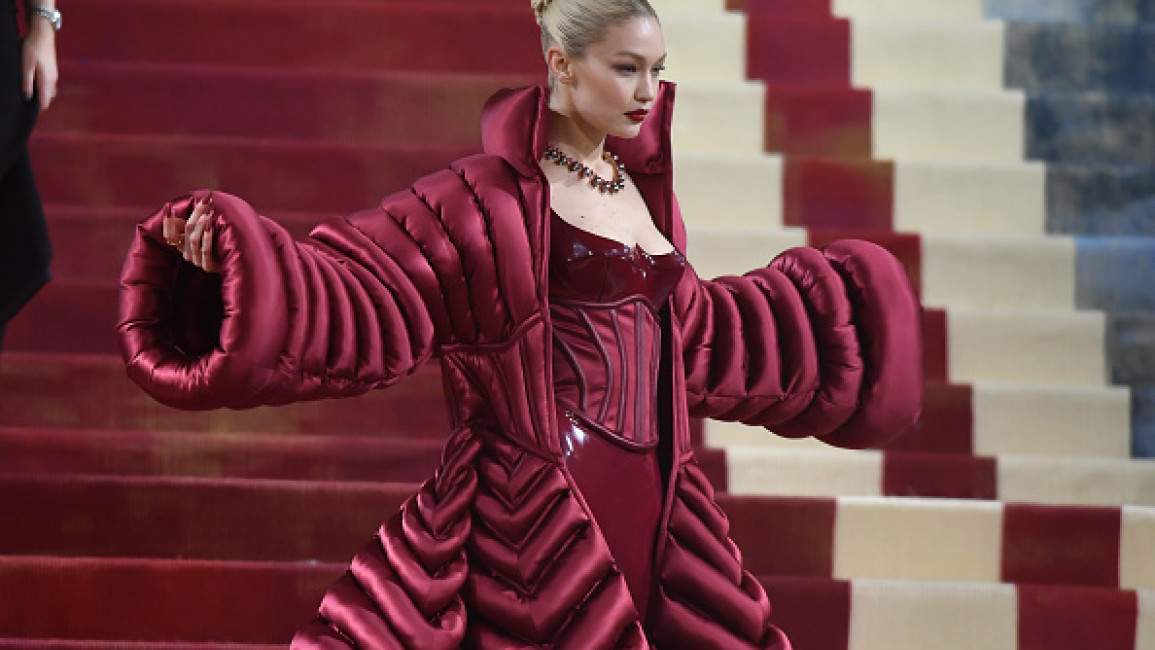 Gigi Hadid Wore a Bold Red Leather Catsuit and Corset to the 2022 Met  Gala—See Pics