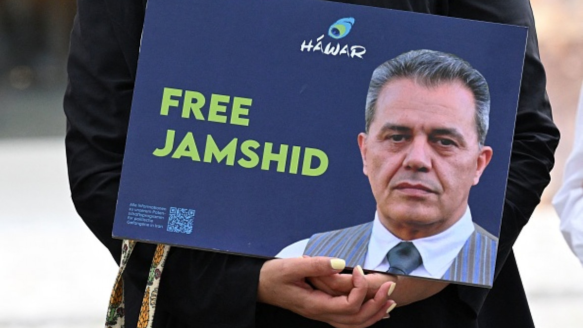 	A demonstrator holds a picture of Iranian-German Jamshid Sharmahd, who has been sentenced to death in Iran, and with the lettering 'Free Jamshid' during a demonstration for his release in front of the German Foreign Ministry in Berlin on July 31, 2023.