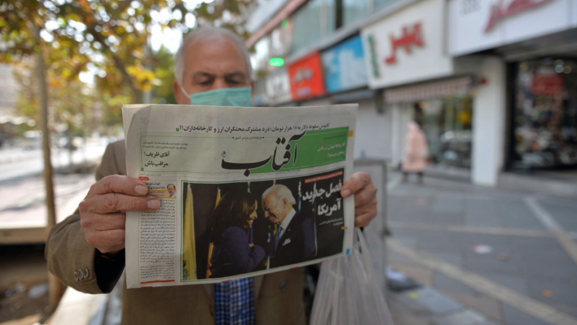 A view from Tehran's street as a citizen reading the news regarding the U.S. elections in newspapers, on November 09, 2020 in Tehran, Iran [Getty Images]