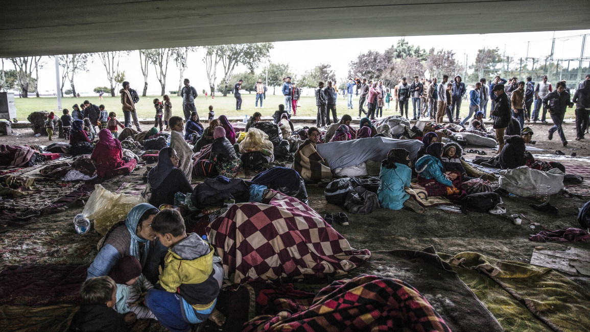 Afghan refugees seeking to reach Europe are seen under a viaduct where they have been staying for about three months in Zeytinburnu District of Istanbul, Turkey [Getty Images]