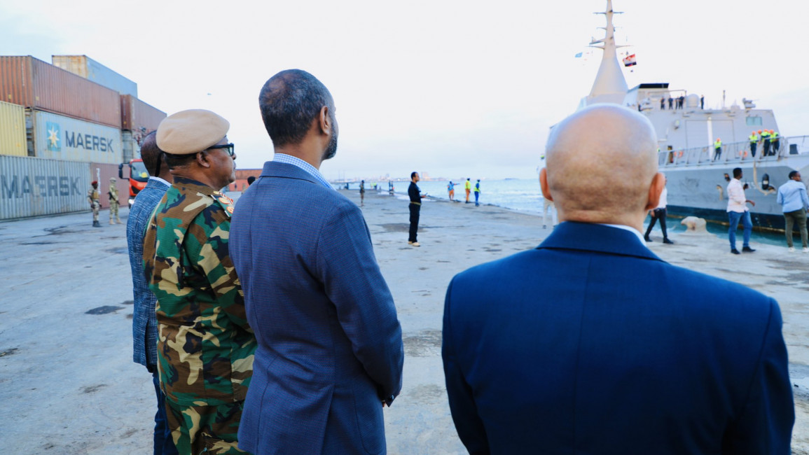 Somali Defence Minister Nur looking at the docked Egyptian naval vessel carrying the 2nd arms delivery to the African nation in a month. [X]