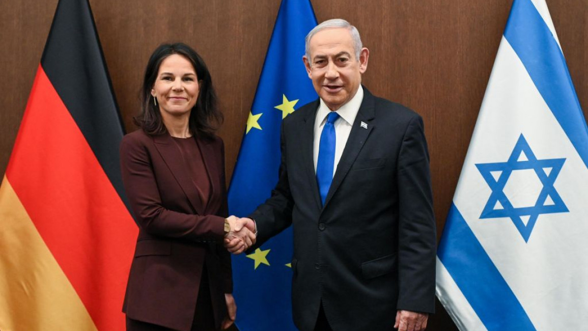 Annalena Baerbock (L) with far-right Israeli PM and alleged war criminal Benjamin Netanyahu [Getty]