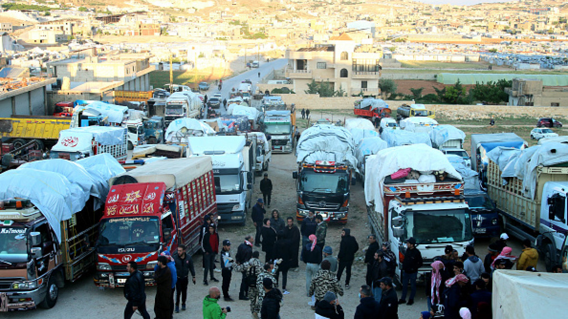 Trucks carrying Syrian refugees and their belongings prepare to leave Lebanon back to Syria, in Arsal in the Bekaa Valley, on May 14, 2024.