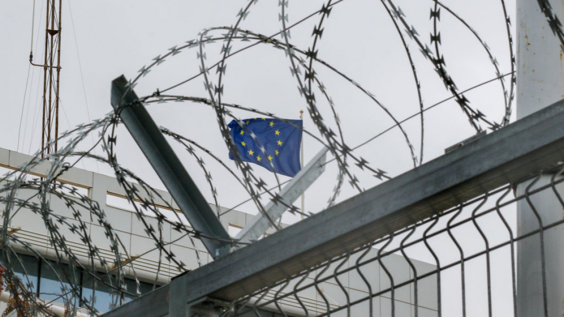 European Union Flag during a protest in front of the headquarters of the European Union mission in Tunisia