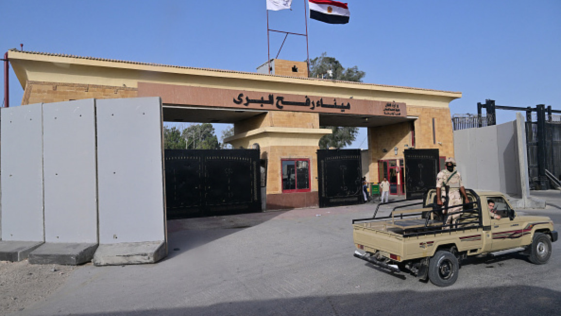 Egyptian army soldiers guard their side of the Rafah crossing, closed since early May, on July 4, 2024, as the conflict between Israel and the Palestinian Hamas movement continues. [Getty] 