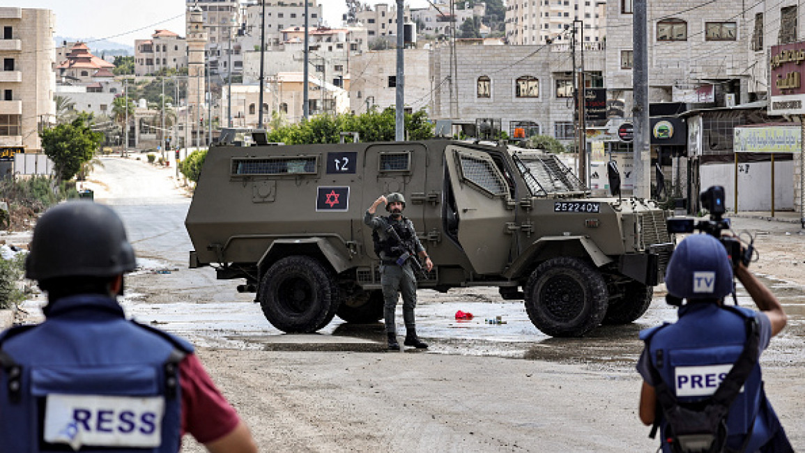 Palestinian journalists in West Bank [Getty]