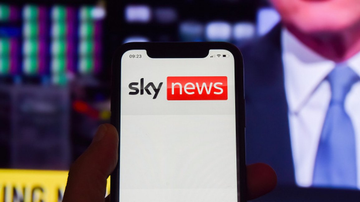 In photo illustration, the Sky News logo seen displayed on a...