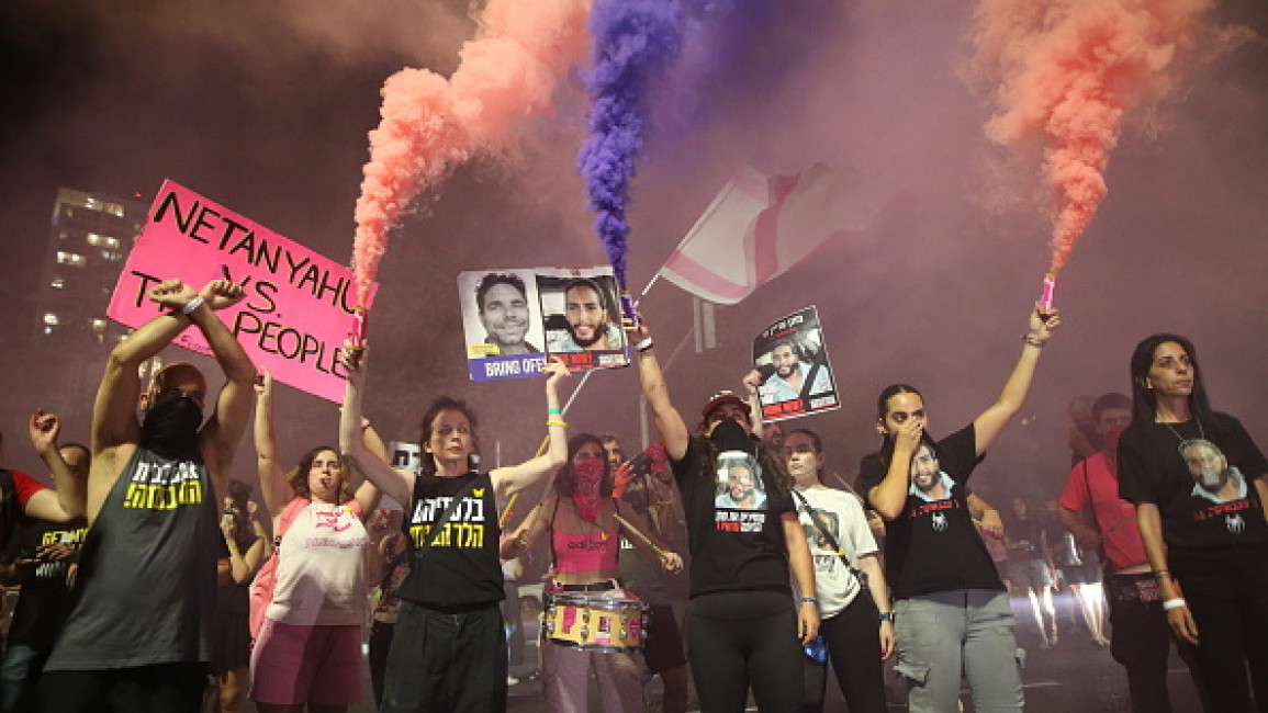 Thousands of Israelis gather with banners and Israel flags to protest against Israeli Prime Minister Benjamin Netanyahu and his government for not signing the ceasefire agreement with Gaza and to demand hostage swap deal with Palestinians in Tel Aviv, Israel on September 14, 2024.