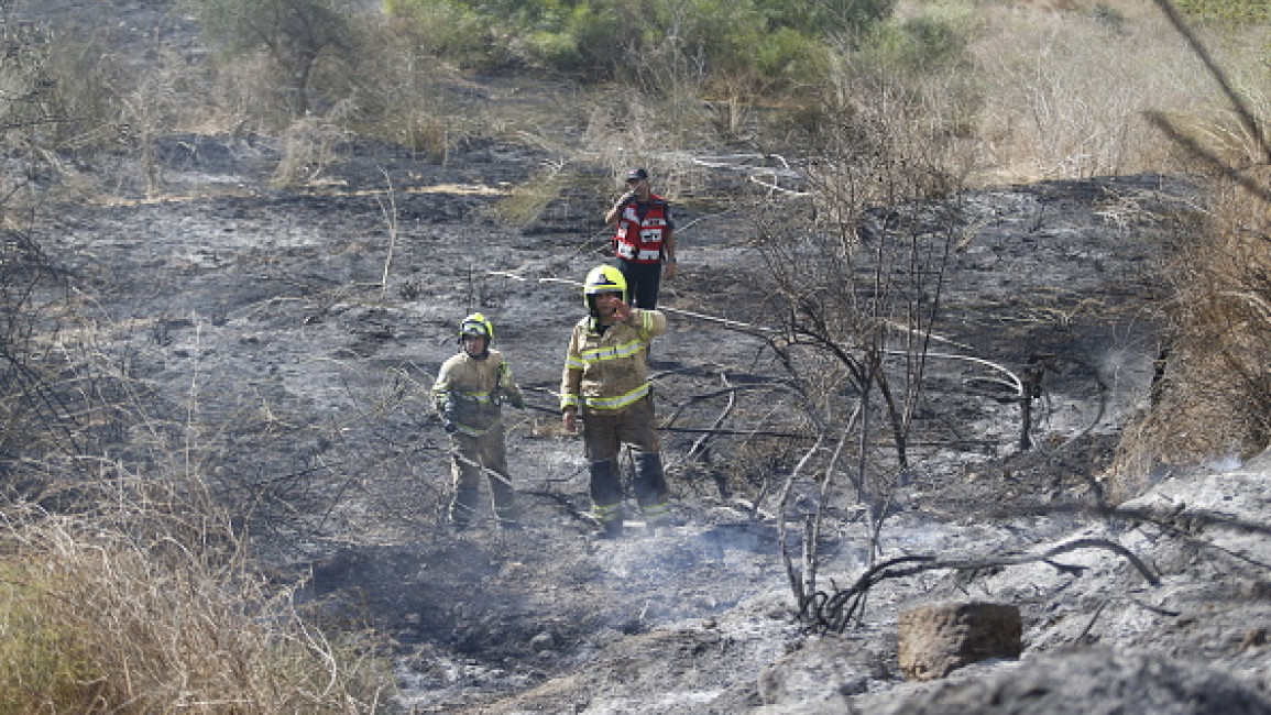 Firefighters try to extinguish the fires as nine Israelis were injured with minor wounds following the launch of a surface-to-surface missile from Yemen towards Lod, Israel according to Israeli army, on September 15, 2024. (Photo by Saeed Qaq/Anadolu via Getty Images)