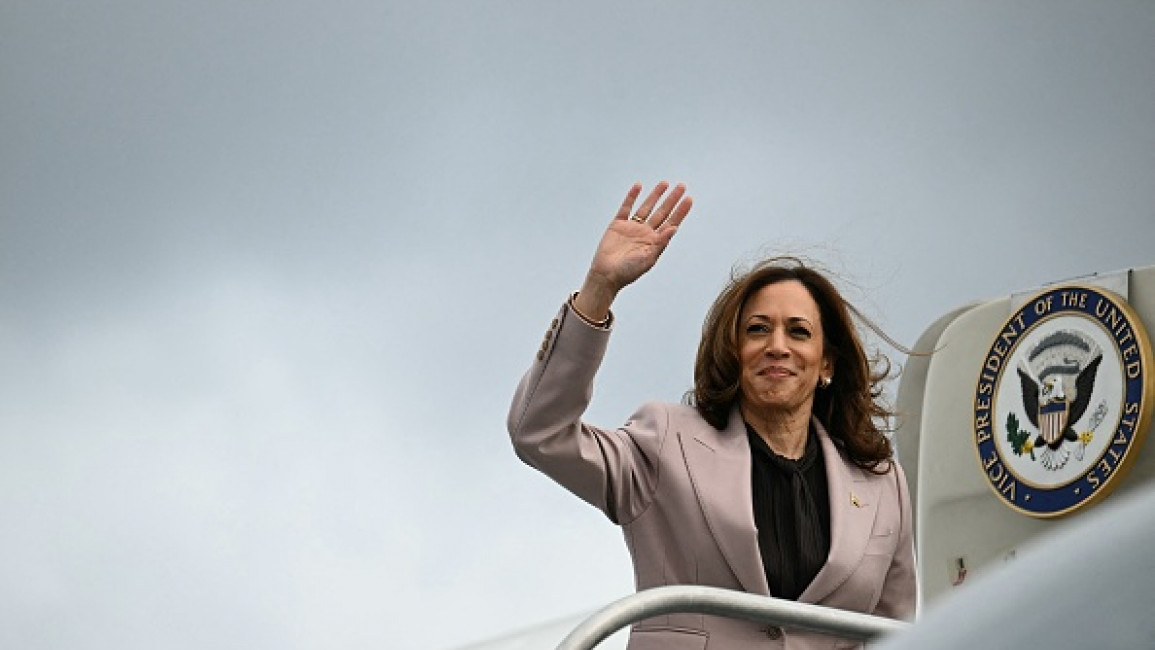 US Vice President and Democratic presidential candidate Kamala Harris waves as she boards Air Force Two at Philadelphia International Airport in Philadelphia, Pennsylvania, on September 17, 2024