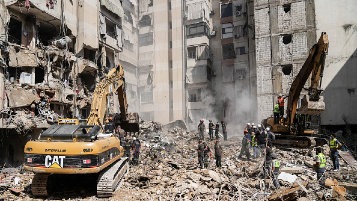 Rescuers sift through the rubble at the scene of an Israeli strike that targeted one of Beirut's southern suburbs, as search and rescue operations continue on September 21, 2024. (Photo by Fadel Itani/NurPhoto via Getty Images)