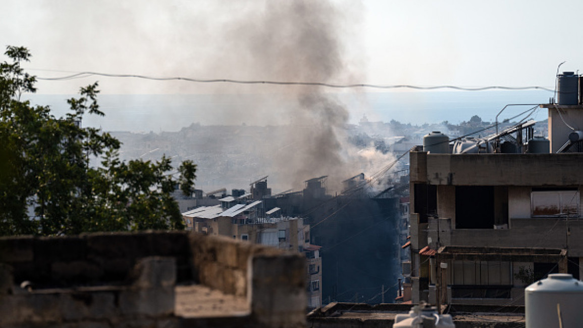  Smoke rises from a building following an Israeli airstrike on September 28, 2024 in Beirut, Lebanon. 