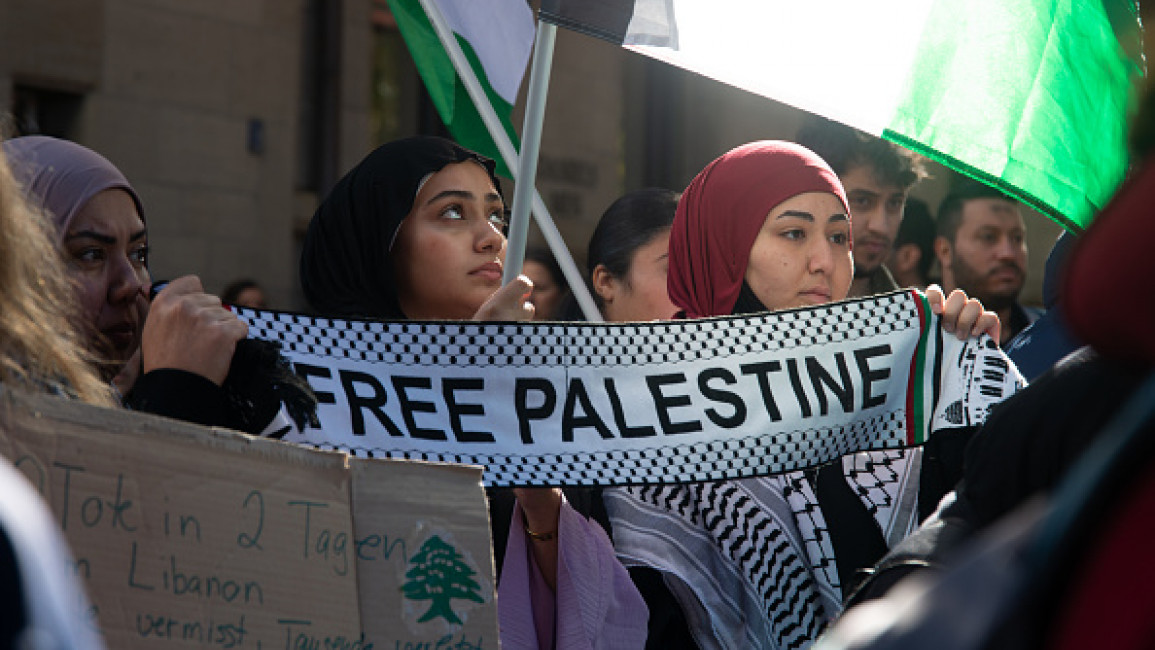 About a hundred pro-Palestinian protesters gather in Bonn, Germany, on September 28, 2024, and protest against Israel's attack in Lebanon, demanding a ceasefire and an end to arming Israel. (Photo by Ying Tang/NurPhoto via Getty Images)