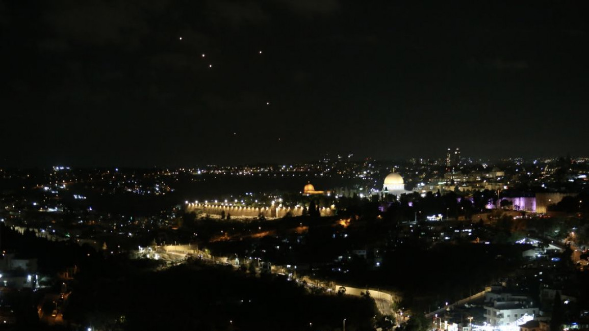 Rockets fired from Iran to Israel are seen over Jerusalem