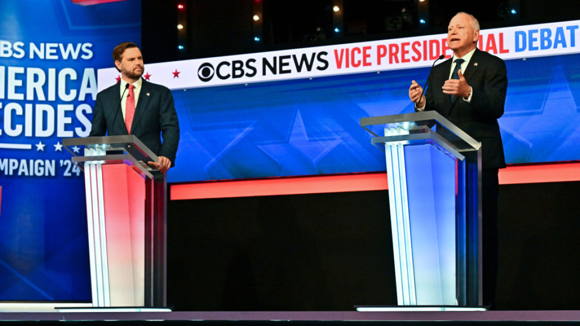 Sen. JD Vance (R-Ohio) and Minnesota Gov. Tim Walz take part in the vice-presidential debate at CBS Studios on 1 October 2024