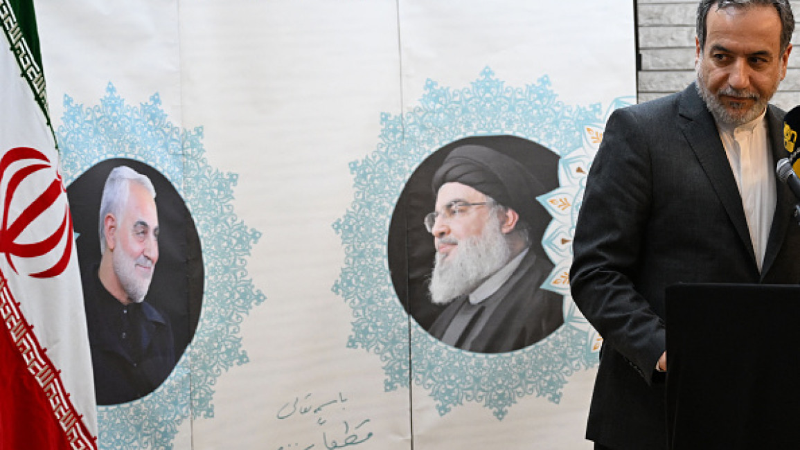 Iranian Foreign Minister Abbas Araghchi speaks to the press after meeting with Syrian officials at the Iranian embassy in Damascus on October 5, 2024. (Photo by LOUAI BESHARA/AFP via Getty Images)