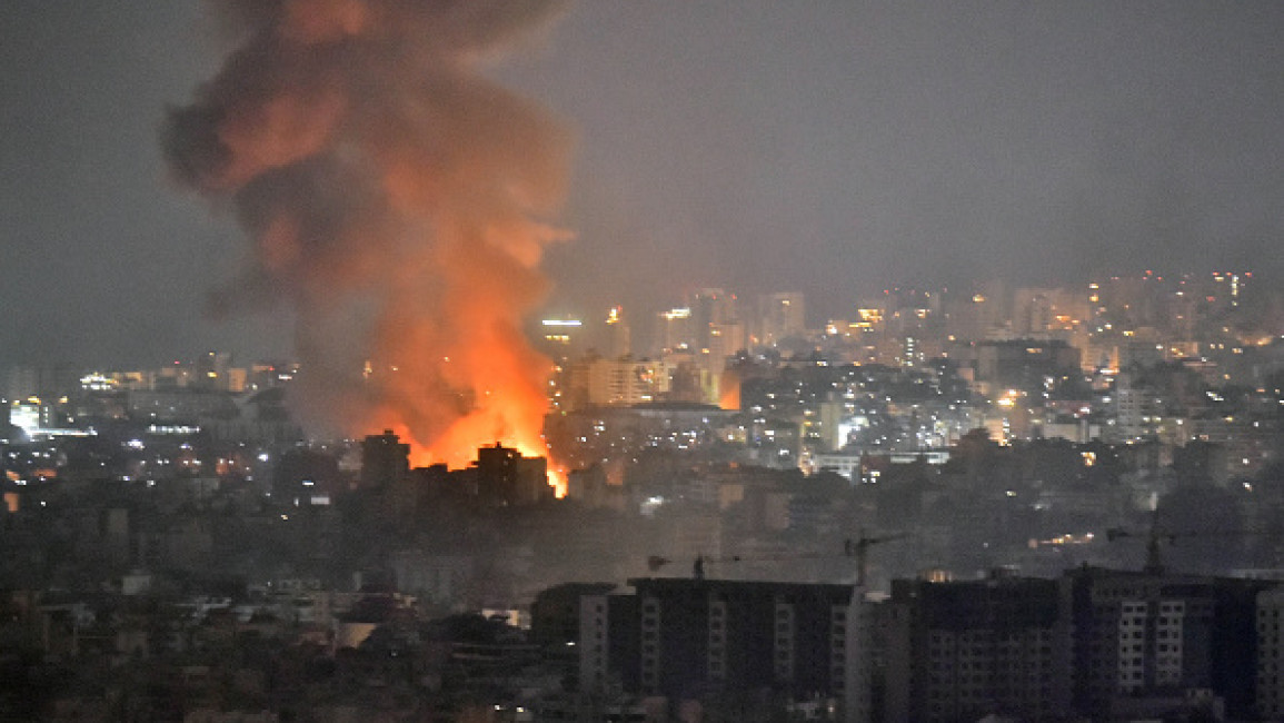 Smoke and flames rise after an Israeli airstrike on an area south of Beirut, Lebanon on October 05, 2024. (Photo by Houssam Shbaro/Anadolu via Getty Images)