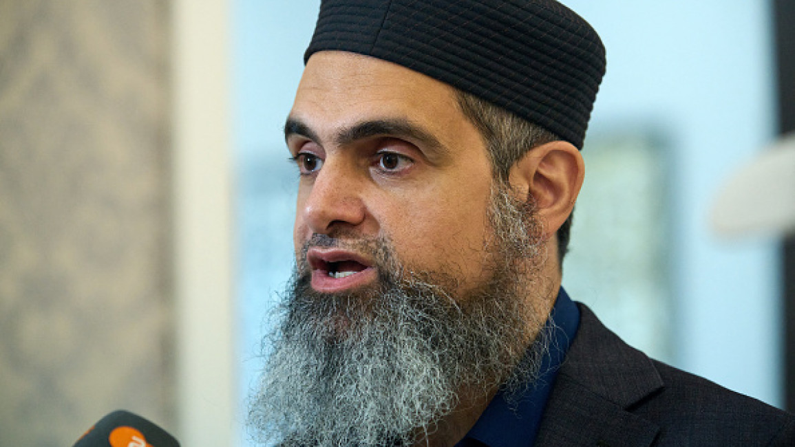 	Hassan Abdel Salam, co-founder of the "Abandon Harris" campaign, speaks at an event with Workers Strike Back during an event endorsing Green Party candidate Jill Stein at the Bint Jebail Cultural Center in Dearborn, MI on Friday, Oct. 6, 2024.