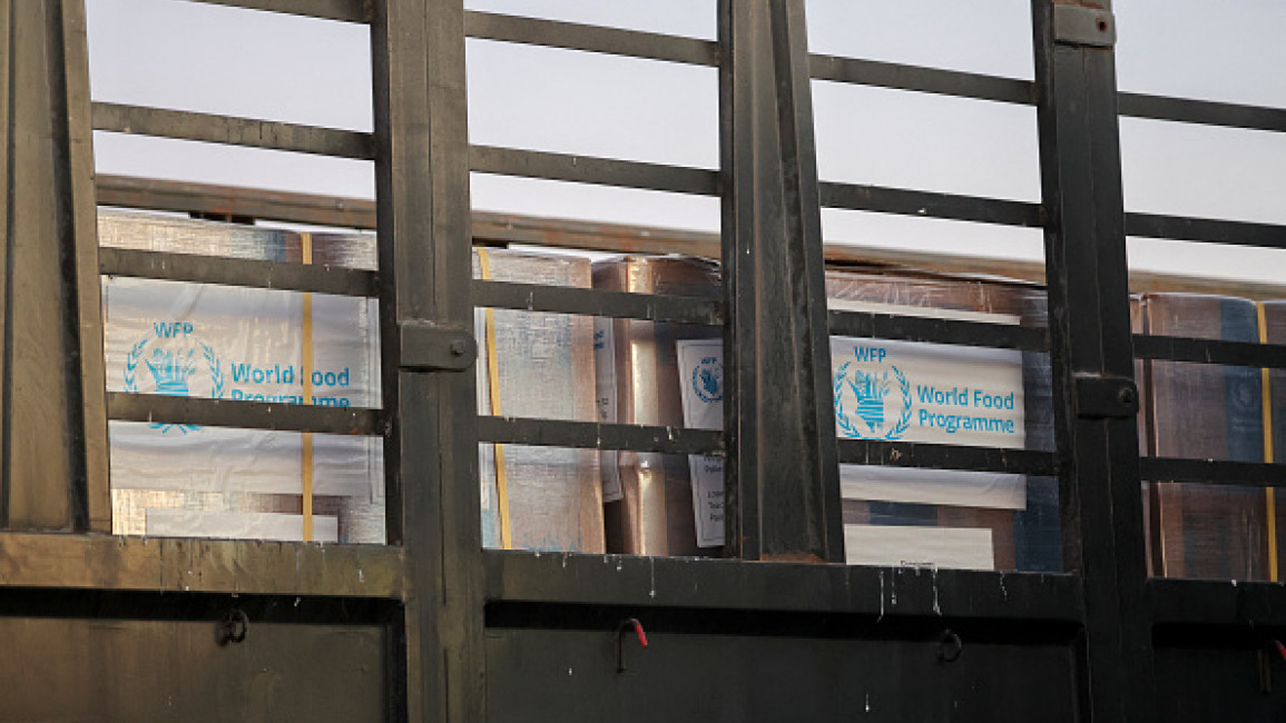 Trucks loaded with humanitarian aid delivered from Jordan wait to cross into Gaza on the border between Israel and the northern Gaza Strip, through the Israeli-controlled Erez crossing on October 21, 2024.