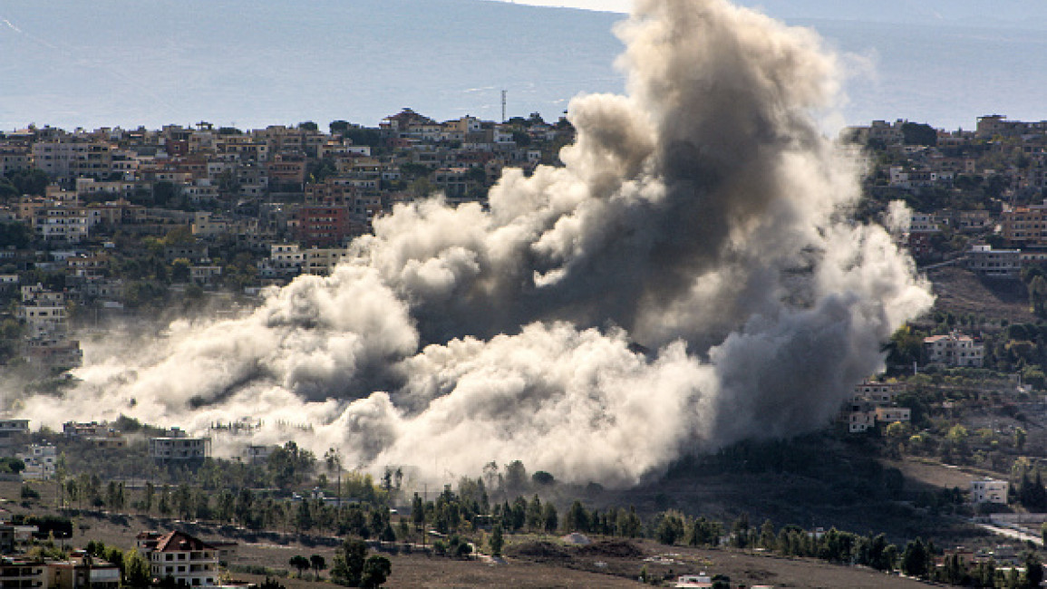 Smoke clouds rise following an Israeli air strike on the village of Khiam (Photo by -/AFP via Getty Images)