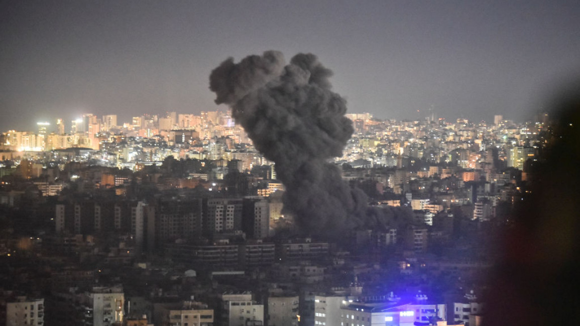 Smoke rises from the site of an Israeli airstrike that targets a neighborhood in Beirut's southern suburbs