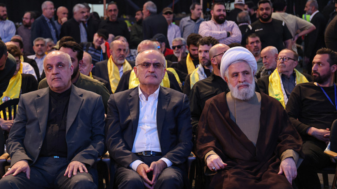 	Deputy chief of the Lebanese Hezbollah group Naim Qassem (R) attends a commemoration ceremony alongside former finance minister Ali Hassan Khalil (C) and Iran's Ambassador in Lebanon Mojtaba Amani, at the memorial grave of slain Hezbollah commander Imad Mughniyeh on April 5, 2024. (Photo by ANWAR AMRO/AFP via Getty Images)