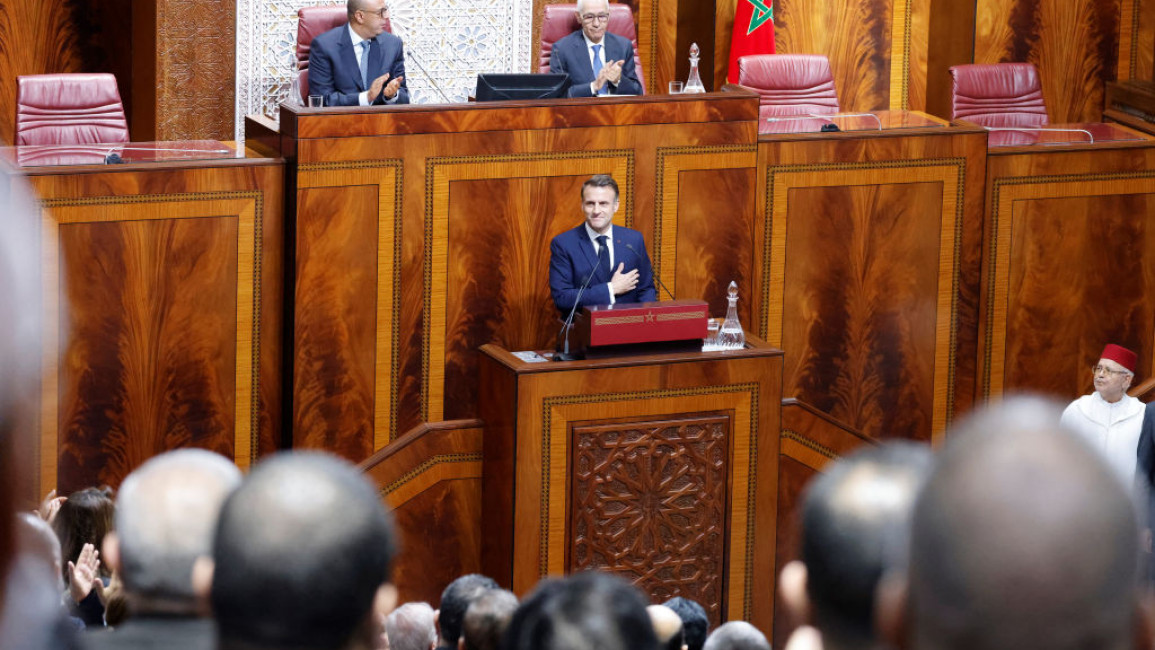 France's President Emmanuel Macron receives a standing ovation after his speech in front of the members of Morocco's Parliament in Rabat on 29 October 2024. 