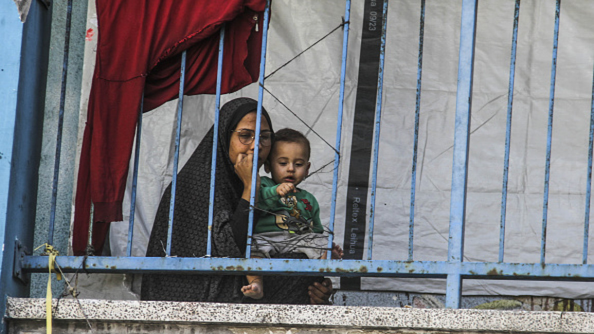  Palestinians go on their daily lives under difficult conditions in the vicinity of the Shati School in the Shati Refugee Camp, where displaced Palestinians live in Gaza City, Gaza on October 29, 2024.