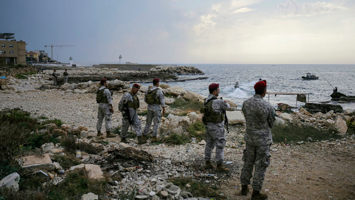 Lebanese soldiers inspect the beach at a landing site for a naval commando force which abducted a Lebanese mariner according to a military source, in the northern coastal town of Batroun on November 2, 2024. (Photo by IBRAHIM CHALHOUB/AFP via Getty)